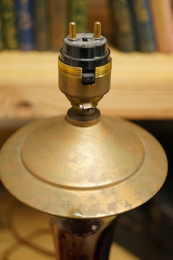 A pair of ruby glass, enamel and gilt metal table lamps, 57cm